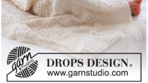 Couverture bébé au tricot, en point structuré, en DROPS Merino Extra Fine par Drops design Garnstudio